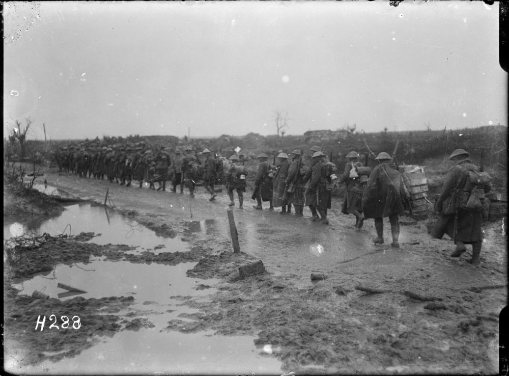 New Zealand reinforcements moving up to the front, near Kansas Farm in the Ypres Salient. 13 October, 1917.